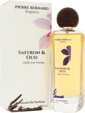 Pierre Bernard Organics Saffron & Oud Extrait De Parfum unisex, bursztynowy płyn, ciemny drewniany korek, butelka i pudełko.
