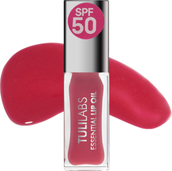 Olejek do ust Tuli Labs Essential Lip Oil Pinky Mood SPF 50. Widok z przodu butelki z aplikatorem i rozlanymi kroplami.