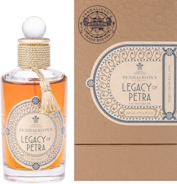 Penhaligon's Legacy of Petra perfumy, bursztynowy flakon z frędzlem i brązowe pudełko z wzorem, z przodu.