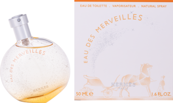 Hermès Eau des Merveilles, damska woda toaletowa w okrągłej butelce i białym pudełku z pomarańczowymi napisami.