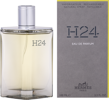 Hermes H24 Eau de Parfum. Przezroczysta butelka z jasnym płynem i szare pudełko z żółtą ramką.