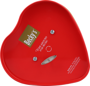 Czerwony, sercowaty spód puszki muzycznej Jingle z mechanizmem pozytywki i napisem "Becky's".