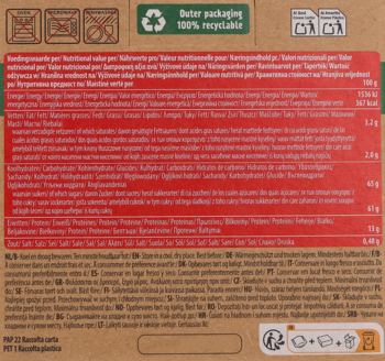 Tył opakowania waniliowej czekolady do picia, z wielojęzyczną tabelą wartości odżywczych oraz zielonym logo recyklingu.