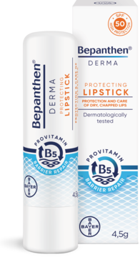 Biała pomadka Bepanthen Derma Protecting Lipstick SPF 50 z B5, obok pudełko. Pielęgnuje suche usta, widok z przodu.