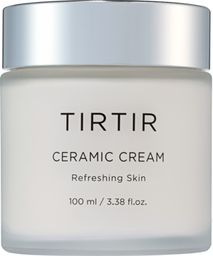 Nawilżający krem do twarzy TIRTIR Ceramic Cream w matowym białym słoiku z srebrną zakrętką, widok z przodu.