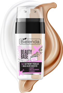 Bielenda Beauty Base Satynowy podkład 2w1 z bazą glow booster, butelka na tle rozlanej formuły.