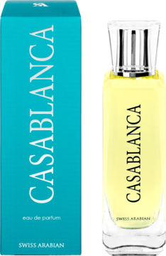 Swiss Arabian Casablanca woda perfumowana, żółta butelka obok turkusowego pudełka, napisy. Ujęcie z przodu.