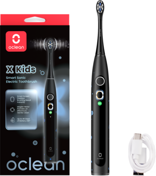 Inteligentna czarna szczoteczka soniczna Oclean X Kids dla dzieci, obok opakowania i kabla USB-C.