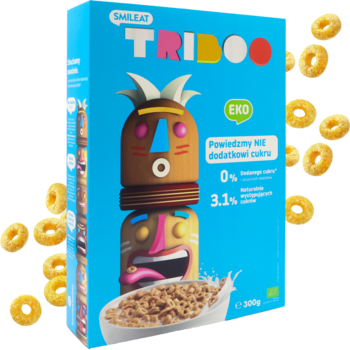 Niebieskie opakowanie Smileat Triboo, kółeczka zbożowe bez cukru, z tribalową grafiką, otoczone złotymi płatkami.