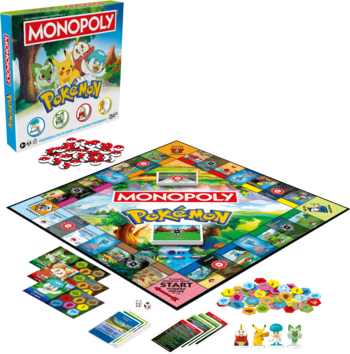 Monopoly Pokemon, gra planszowa z rozłożoną kolorową planszą, pudełkiem, figurkami Pokemon i kartami.