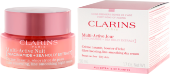 Różowy słoik Clarins Multi-Active Nuit Niacinamide i białe pudełko Multi-Active Jour.