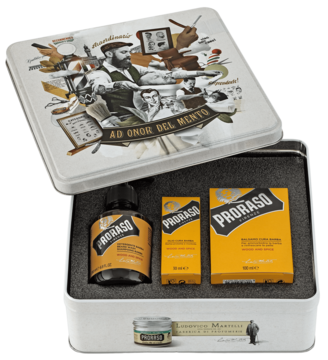Otwarty zestaw Proraso Beard Kit Wood & Spice. Metalowa puszka, butelka olejku i dwa żółte pudełka z kosmetykami.
