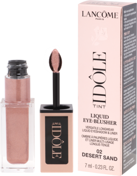Lancôme Idôle Tint Desert Sand, różowo-złoty płynny cień/róż. Widoczna otwarta tuba z aplikatorem i pionowe pudełko.