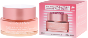 Clarins Multi-Active Jour SPF 15, różowy krem na dzień z niacynamidem i ostrokrzewem, słoik obok pudełka.