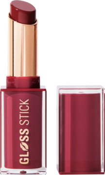 Otwarty błyszczyk Revolution Pout Lip Gloss Stick w odcieniu śliwkowym, z widoczną wysuniętą sztyftem i zakrętką obok.