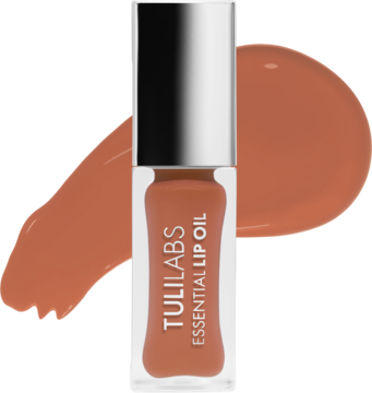 Tuli Labs Essential Lip Oil Dubajska Czekolada w butelce ze srebrną zakrętką, z brązowymi smugami w tle.