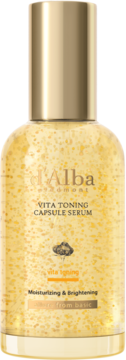 Serum toner d'Alba Vita Toning z kapsułkami, złota butelka z bliska, widok z przodu.