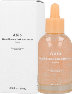 Abib Glutathiosome dark spot serum w pomarańczowej butelce z białą zawiesiną, widok z przodu obok białego pudełka.