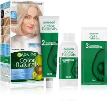 Zestaw farby Garnier Color Naturals Blond, opakowanie z blondynką, obok tubka odżywki i mleczko utleniające. Widok rozłożonego produktu.