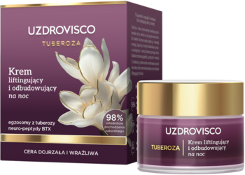 Krem UZDROVISCO TUBEROZA liftingujący na noc w fioletowym słoiczku, obok otwarte pudełko z kwiatem tuberozy.