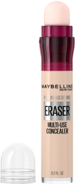 Maybelline Instant Eraser Multi-Use Concealer, beżowa tubka z czerwonym paskiem, gąbkowy aplikator i odkręcona nakrętka obok.
