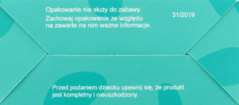Turkusowy spód opakowania Moje pierwsze zagadki CzuCzu z widocznymi zagięciami i polskim tekstem o bezpieczeństwie.