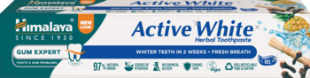 Himalaya Active White wybielająca pasta do zębów. Widok z przodu turkusowego opakowania z napisem i grafiką owoców.