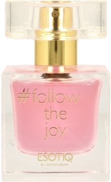 Woda perfumowana Esotiq #follow the joy, butelka z różowym płynem, przezroczysta, złota zakrętka i napis.