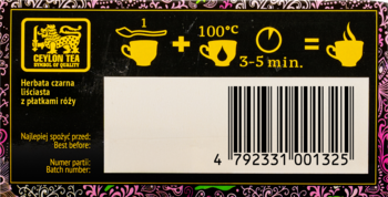 Czarne opakowanie herbaty liściastej z pąkami róży. Z tyłu instrukcje parzenia, logo Ceylon i kod kreskowy.