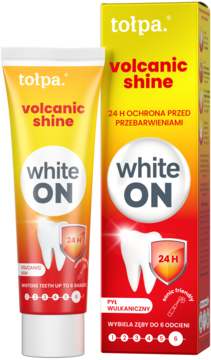 Tołpa Volcanic Shine White ON pasta wybielająca, tubka obok pudełka, żółto-pomarańczowa, chroni 24h, wybiela do 6 odcieni.