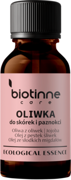 Oliwka Biotinne Core do skórek i paznokci, z olejem jojoba i migdałowym, w brązowej butelce, widok z przodu.