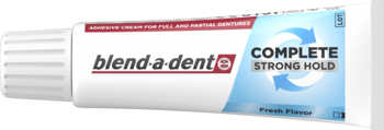 Biała tubka blend-a-dent COMPLETE STRONG HOLD, klej do protez pełnych i częściowych, niebieska etykieta, widok z przodu.