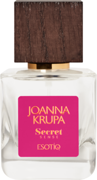 Perfumy Joanna Krupa Secret Sense (porzeczka, jaśmin), butelka z różową etykietą i drewnianą nakrętką, widok z przodu.