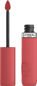 Otwarta matowa pomadka L'Oréal Paris Infaillible Matte Resistance, odcień Shopping Spree. Widok aplikatora i koralowego flakonu.