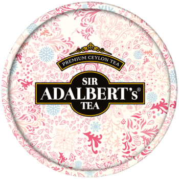 Okrągłe, różowe wieczko herbaty Adalbert's Tea Szczęście, zdobione kwiatami i płatkami śniegu, widok z góry.