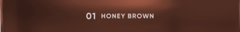 Kremowy bronzer Hazel Light, odcień 01 Honey Brown. Ciemnobrązowy panel z jasnym napisem.